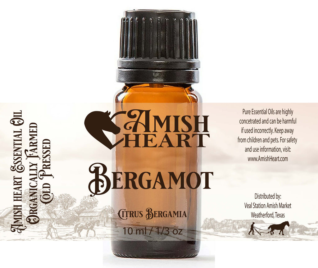 A bottle of Amish Heart Bergamot Essential Oil, showcasing the oil's vibrant, citrusy essence derived from the peels of Italian Bergamot, ideal for aromatherapy and holistic health.