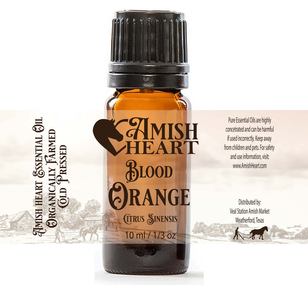 Bottle of Amish Heart Blood Orange Essential Oil, made from organic Citrus sinensis peels, perfect for refreshing and invigorating uses.