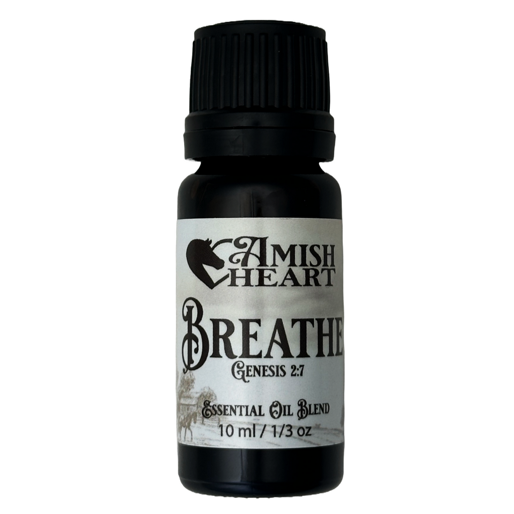 Bottle of Amish Heart Breathe Essential Oil Blend, featuring a blend of eucalyptus, peppermint, and other essential oils for respiratory support and clearer breathing.