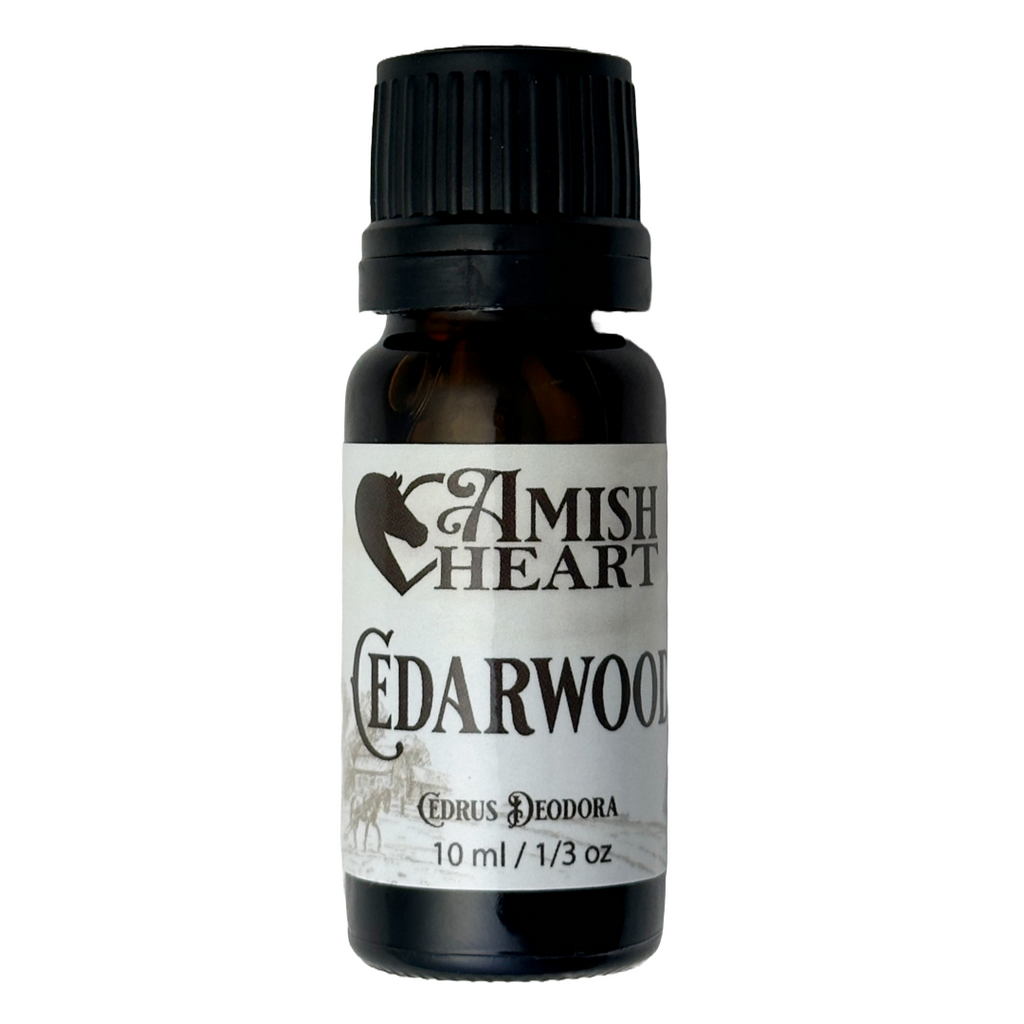 Cedarwood Essential Oil by Amish Heart, featuring a warm, woody aroma, made from wildcrafted Himalayan cedar.