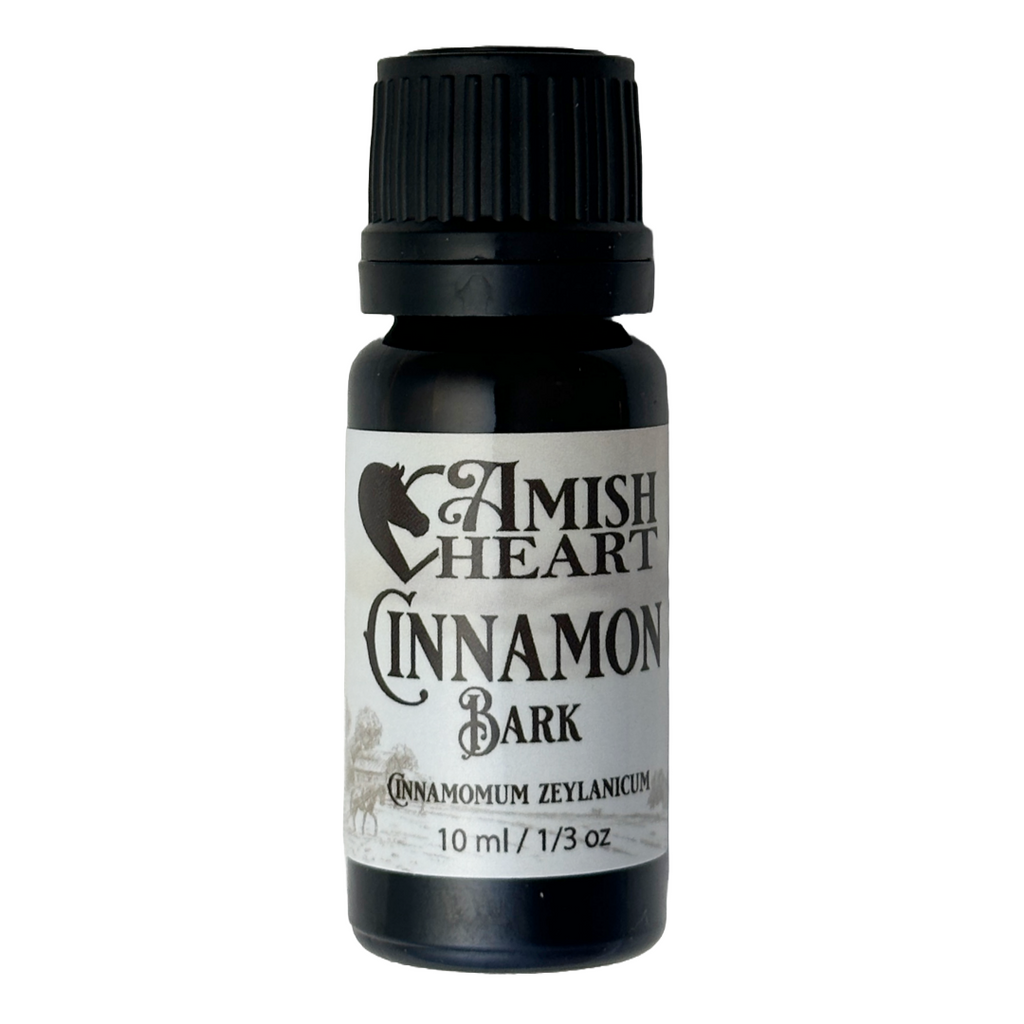 Cinnamon Bark Essential Oil by Amish Heart, featuring warm, spicy aroma, and organic, steam-distilled from Madagascar.