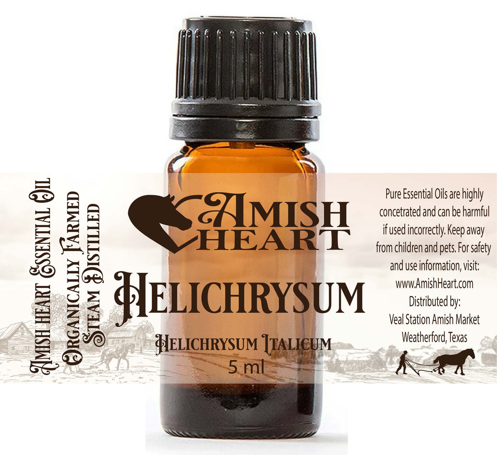 Helichrysum Essential Oil by Amish Heart in a 5ml bottle, derived from organic Helichrysum italicum flowers, known for its healing and rejuvenating properties.