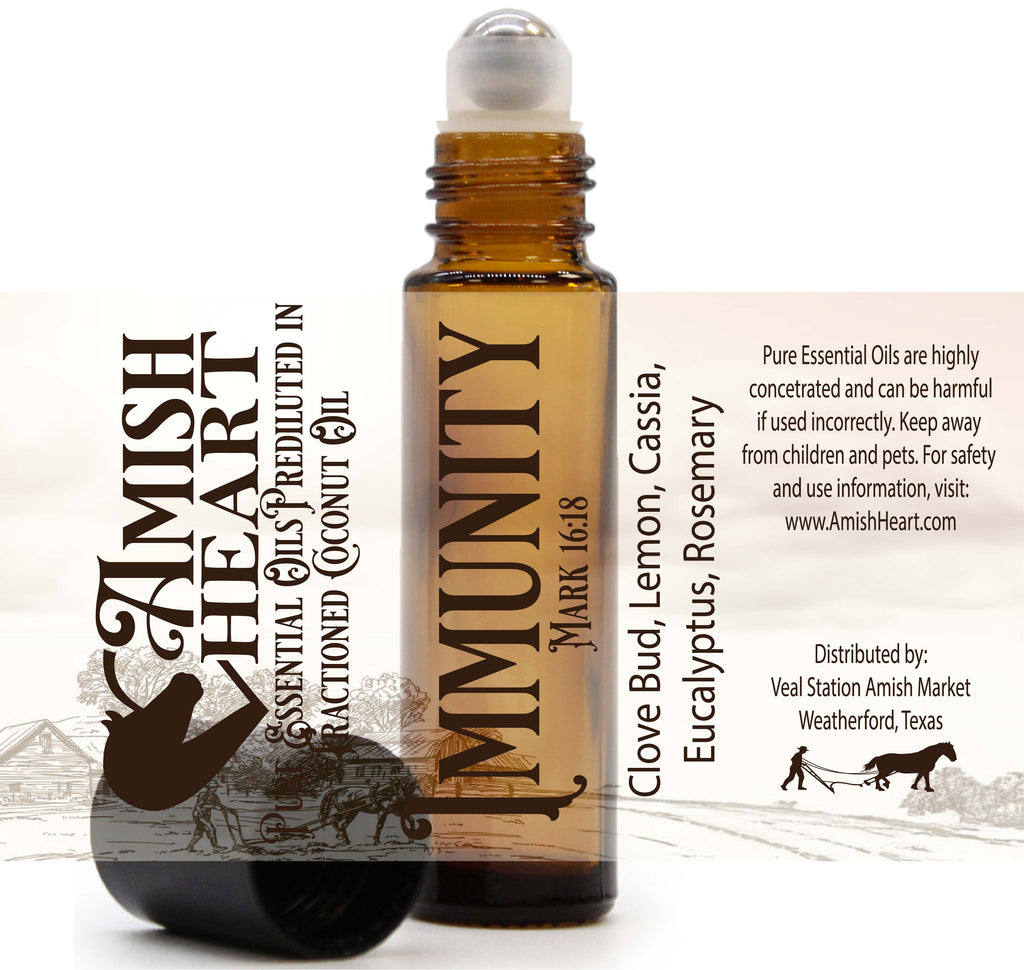 Immunity Roller by Amish Heart, a convenient roller applicator filled with a protective blend of essential oils like Clove and Eucalyptus, inspired by thieves oil for on-the-go immune support.