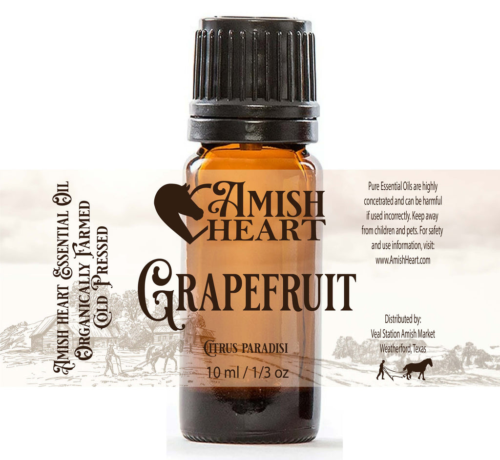 Pink Grapefruit Essential Oil in a 10ml bottle, showcasing its vibrant, citrusy essence.